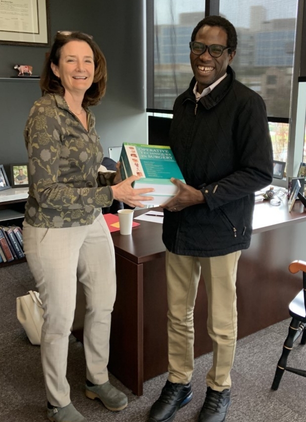 Dr. Barnabas Alayande (right) meets with Department Chair Dr. Mary Hawn.