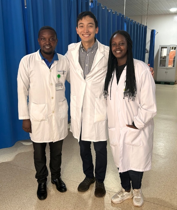 Dr. Jung Min with two Rwandan residents at RMH in Kigali.