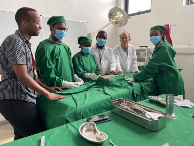 Dr. Bronk works with UGHE students and teachers in the simulated operating room.