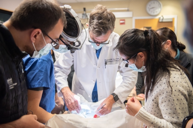 HPB Surgeon Dr. Visser teaches students to perform an HJ