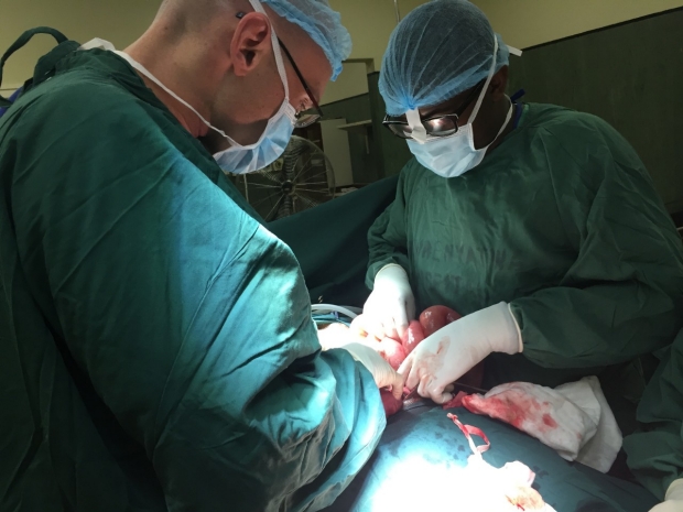 Dr. Joe Forrester performing surgery in Zimbabwe