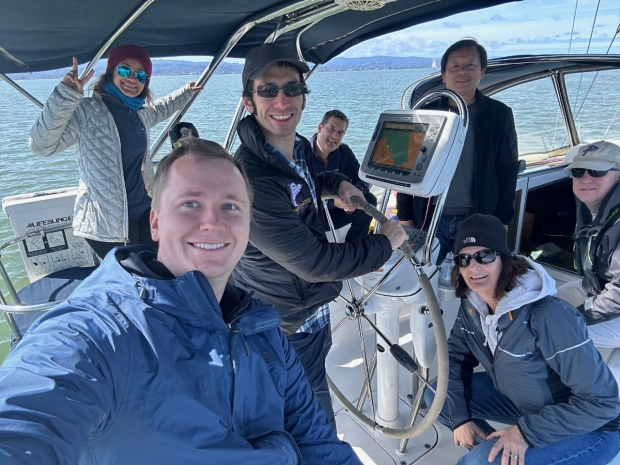 Faculty sailing on Dr. Hawn's boat as part of the 2024 Doctor Day Celebration